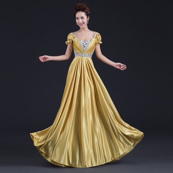 red and gold gown with sleeves